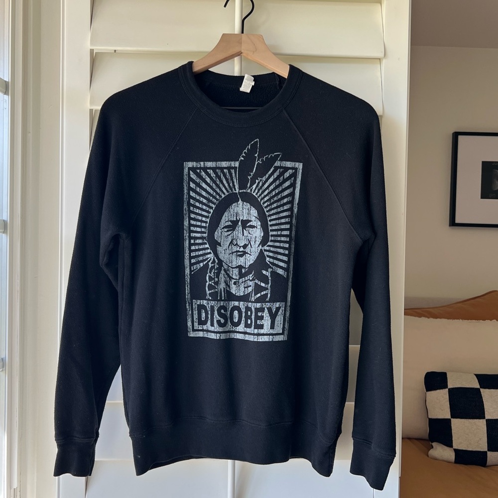 Black casual crewneck sweatshirt. 
Super comfy & warm. Purchased in New Mexico.